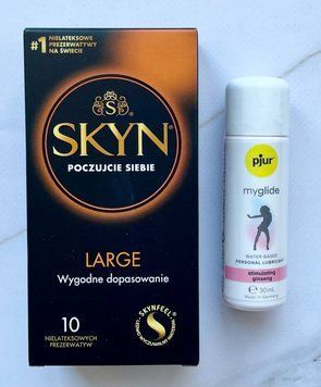 Комплект SKYN Large 10 шт + pjur my glide 30 мл, з женьшенем SOS1927 фото