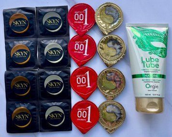 Набор из 16 штук Olo, Skyn ​​+ лубрикант LUBE TUBE NATURE, 150 мл ORGIE SOS4033 фото