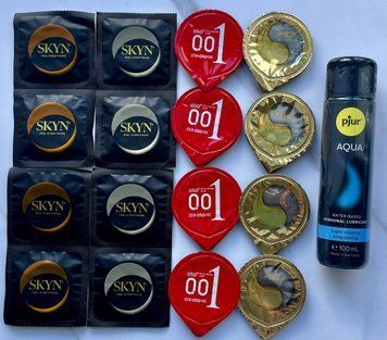 Набор из 16 штук Olo, Skyn ​​+ лубрикант pjur Aqua (100 мл) SOS4034 фото