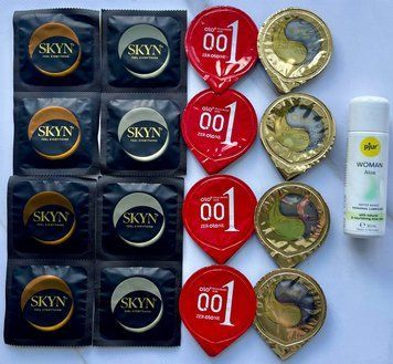 Набор из 16 штук Olo, Skyn ​​+ лубрикант pjur Woman Aloe (30 мл) SOS4038 фото